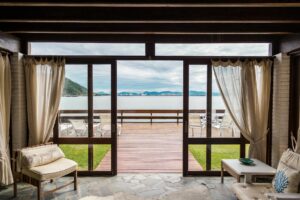 How Do Waterfront Properties Differ From Inland Luxury Estates?